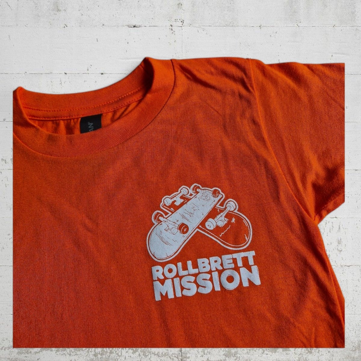 Rollbrett Mission T-Shirt Kids 3D Mini Logo orange - Shirts & Tops - Rollbrett Mission